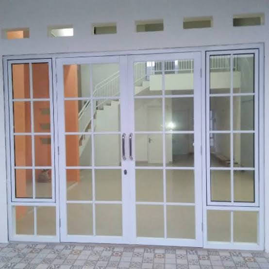 Area Resepsionis & Ruang Kerja - Penataan furnitur built-in dan tata cahaya kerja